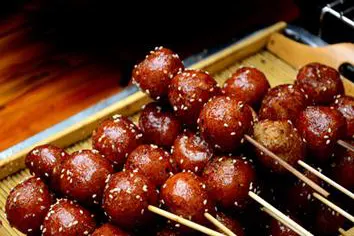 Sugar-oil balls on a skewer
