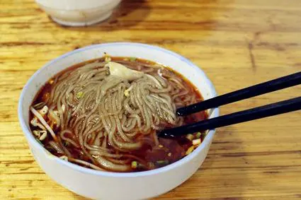 A bowl of red-oil noodles