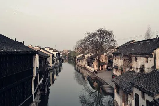 A water-town lane at dawn