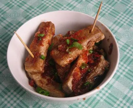 Hairy tofu fried to a blistered golden crust, served with chilli sauce