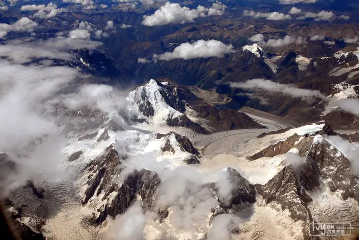 On the way in, the aircraft crosses the Himalaya; on a clear day the peaks and glaciers run to the horizon