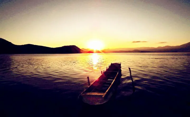 A pig-trough canoe at first light