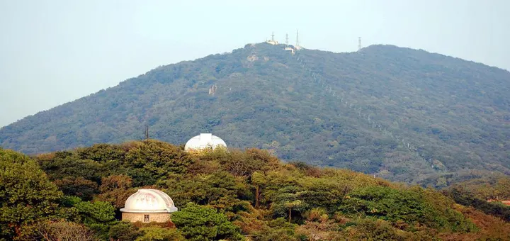 Observatory domes on the summit ridge of Purple Mountain