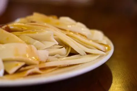 Wantuo cut into strips, dressed with vinegar and chilli oil