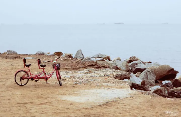 Riding the ring road beside the sea